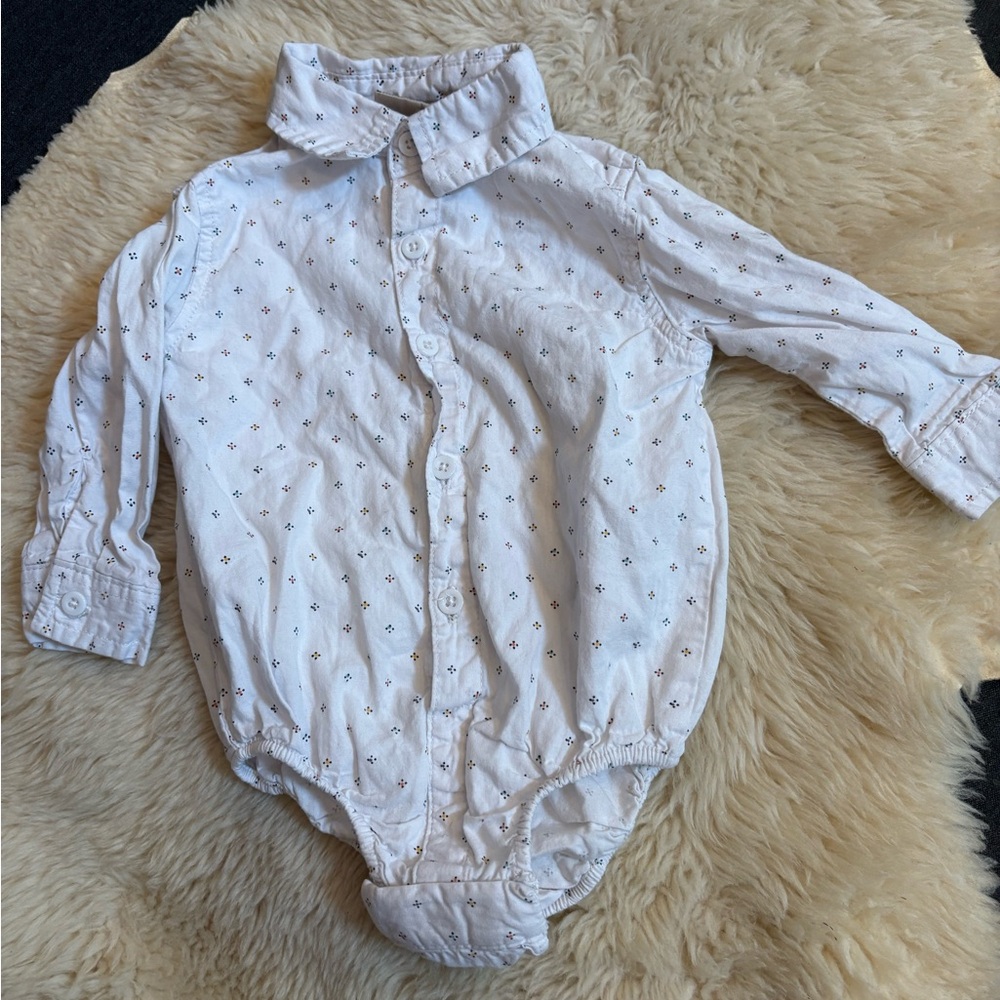 Classic White Button-Front Baby One-Piece with Subtle Print